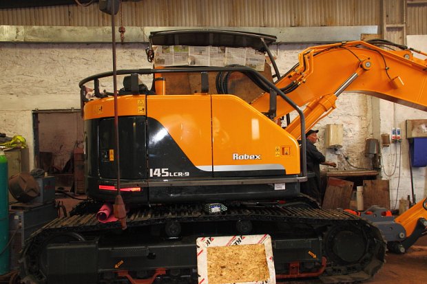 Fitting the guarding around the counterweight and the cab