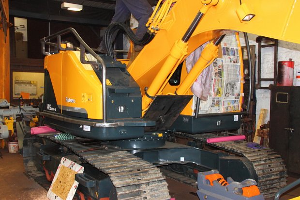 Carefully shaped metalwork to fit around the curved body