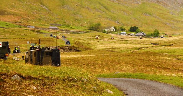 A forward control landrover tagging along for the fun